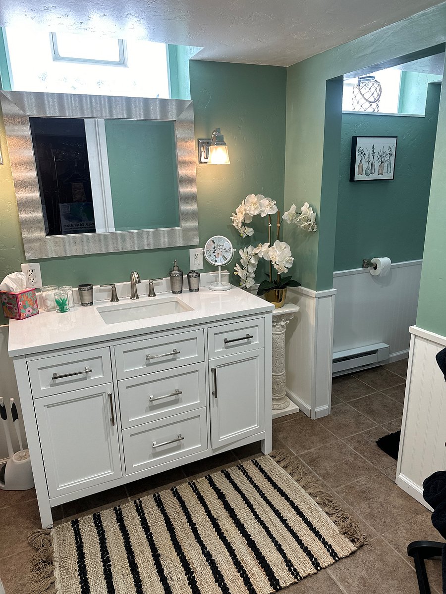 Private Bathroom, Floor Pan Shower, Basement, Renovated in 2023, Assigned to "Elegant Room"