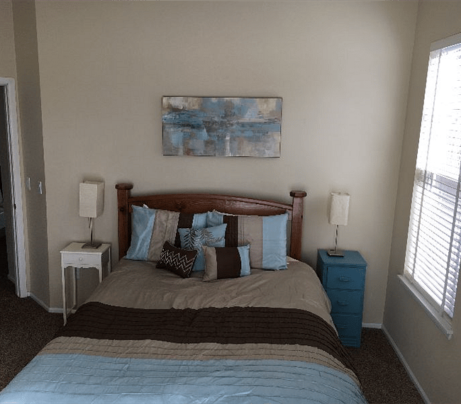 Main bedroom with queen bed, memory foam mattress. Blankets and sheets are provided.