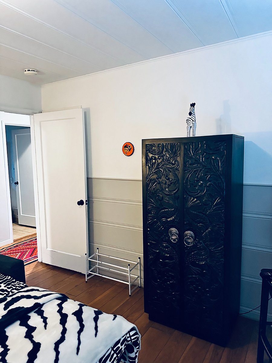 Closet plus beautiful armoire for your clothes.