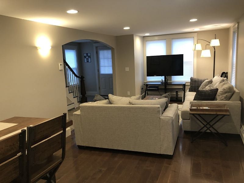 View of living area and stairs