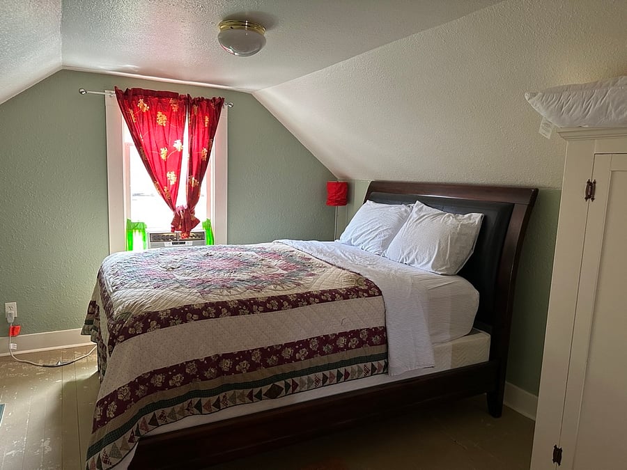 Upstairs bedroom with queen bed