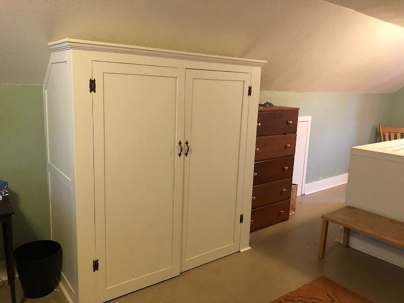 Full size closet  and dresser in upstairs attic bedroom.