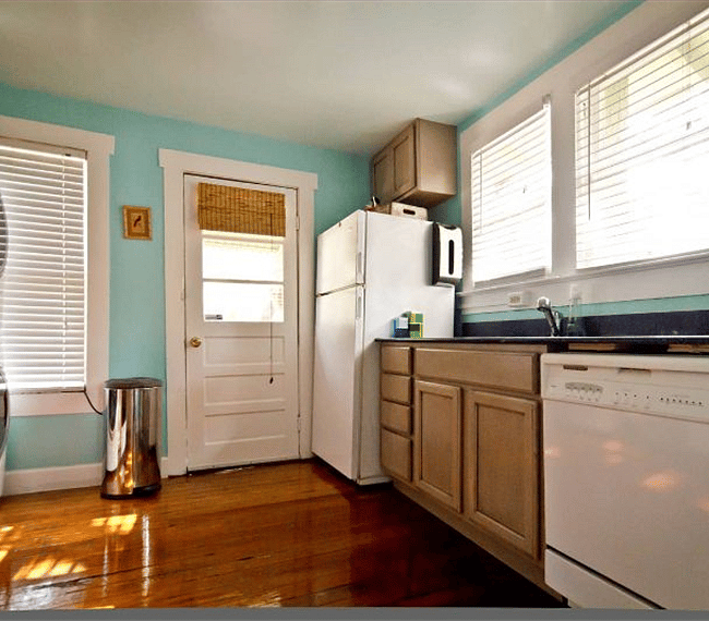 Kitchen with refrigerator/freezer and dishwasher.