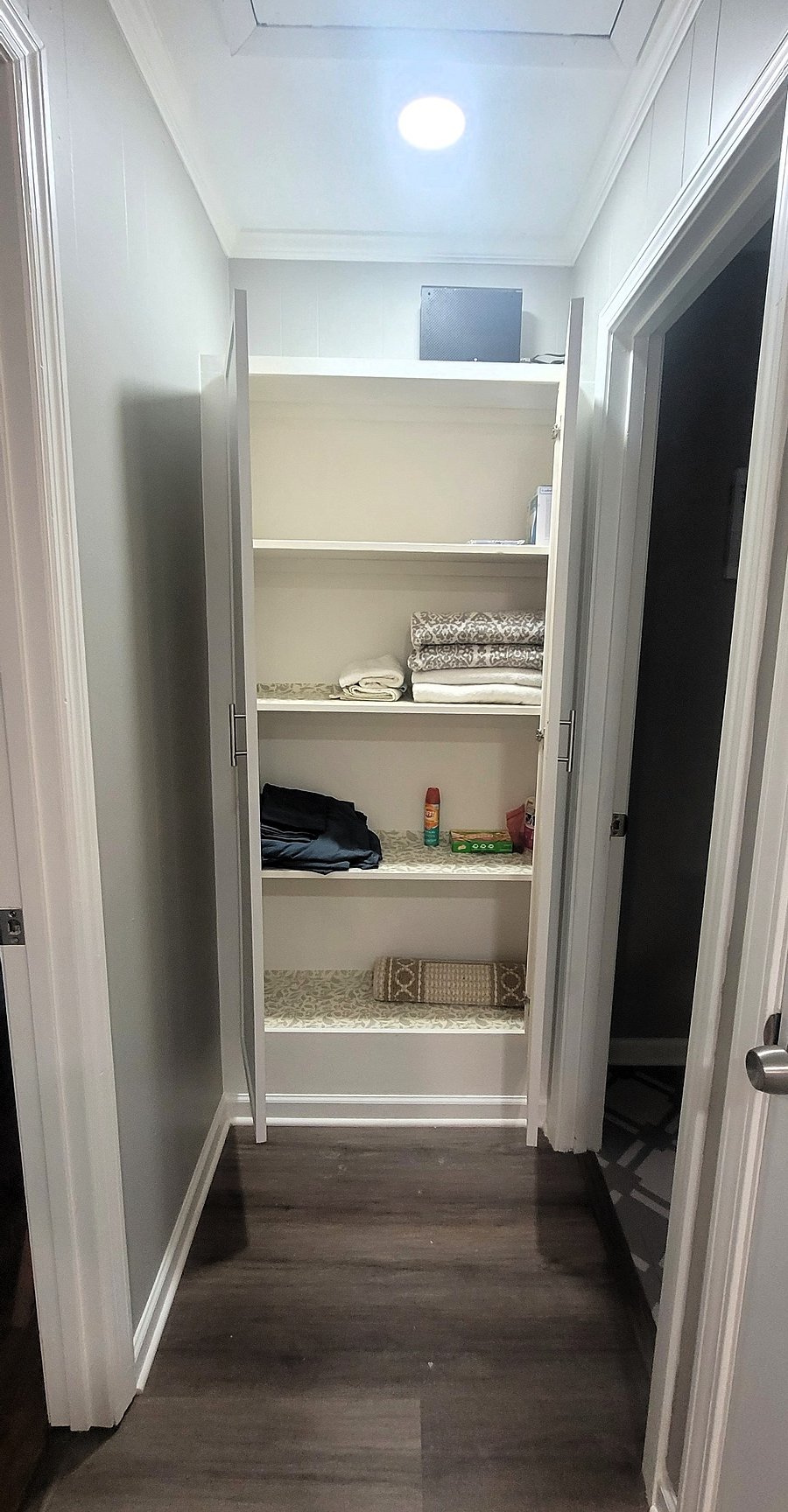 Clean linens will be found here and there's extra space for your toiletries here, as well.