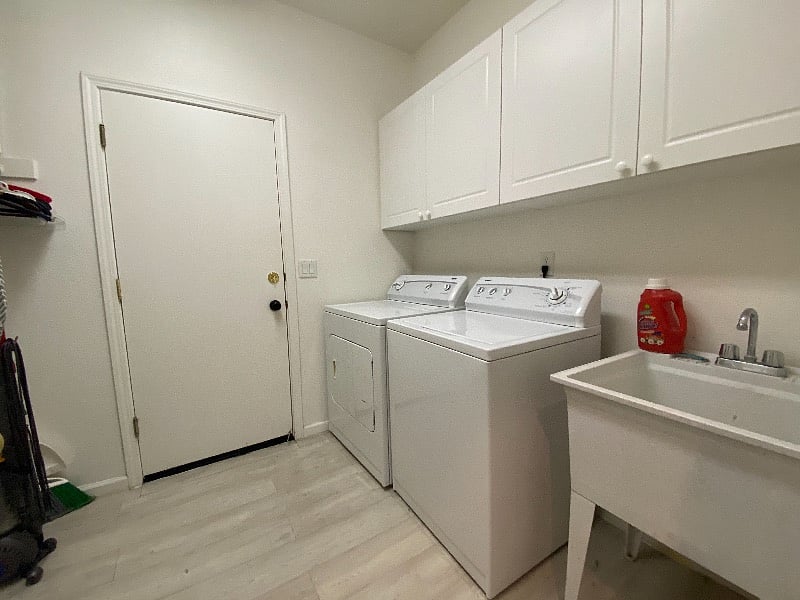 Laundry Room
Washer, Dryer, sink, cabinets, and shelving for your use.