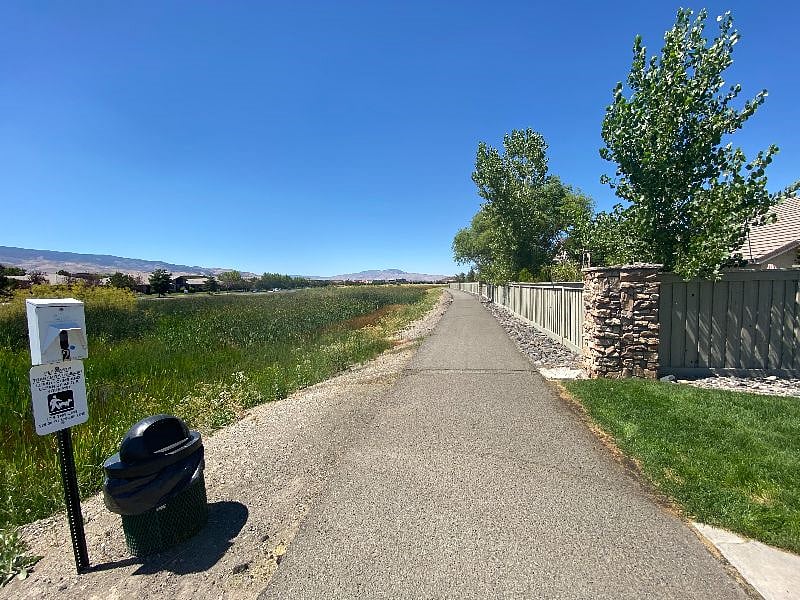 Walking trail only 5 houses away from the house - alongside wetlands where you can see birds and plants along your quiet walk.