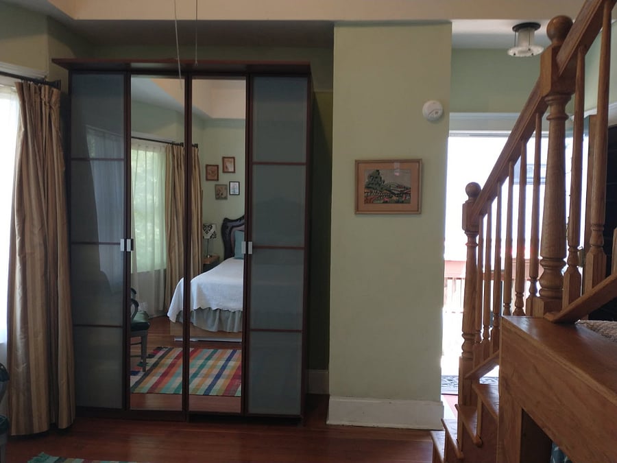 Large wardrobe in bedroom.