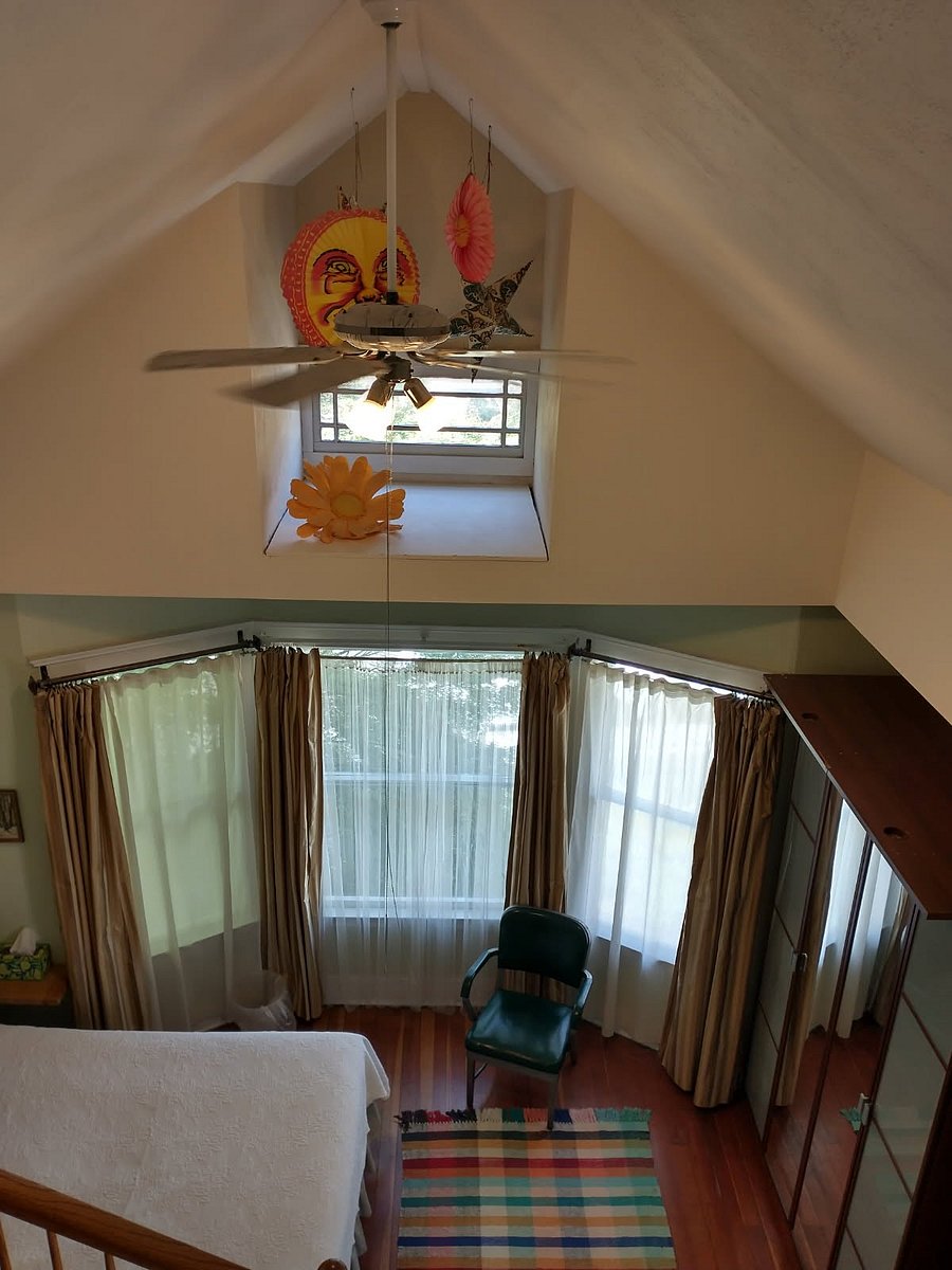 Looking down at the bedroom space from the upper level.