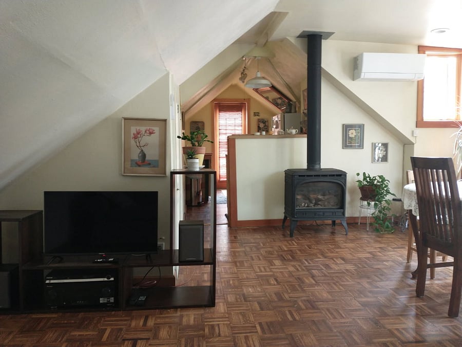 Smart TV, stereo, and cozy gas fireplace.