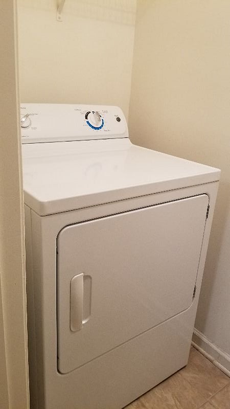 Dryer opposite side of room from washer