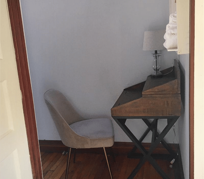 Secretary desk in pass-through space