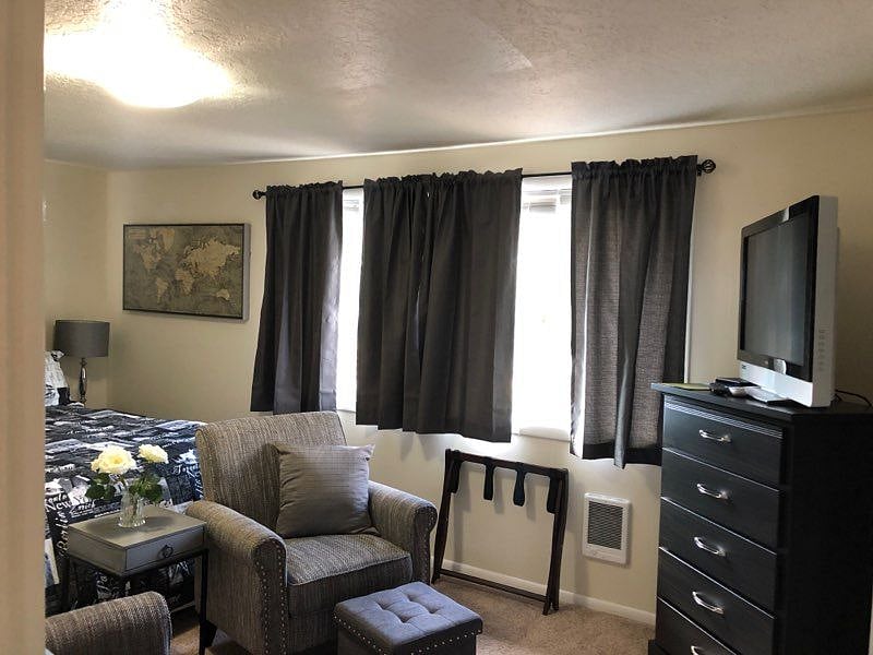 Settle in and watch a movie on the flat screen TV
