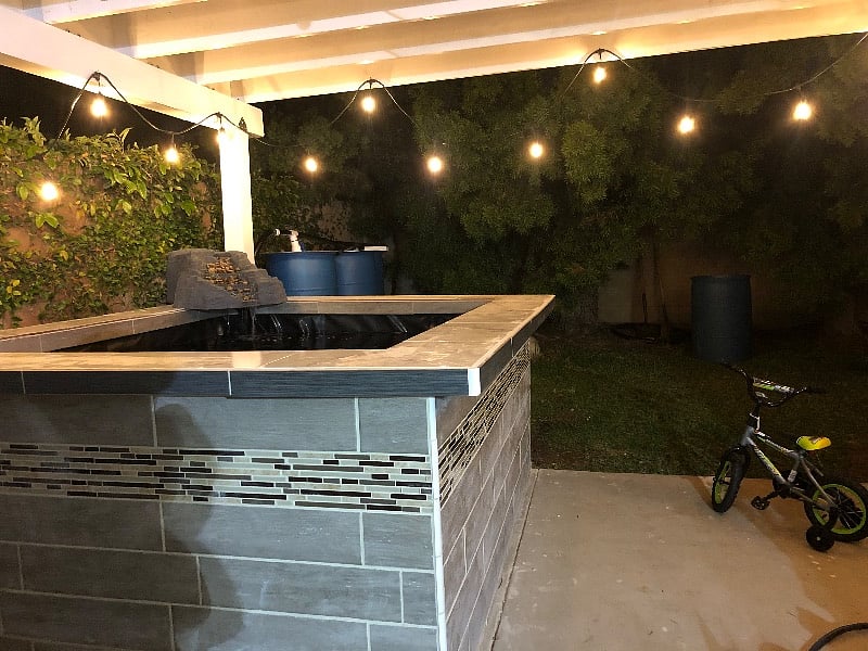 Koi pond connecting to the backyard