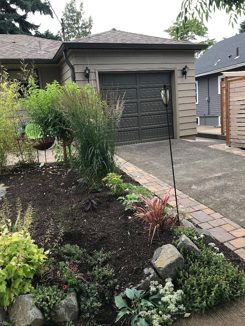 Walkway along garage side to private entrance