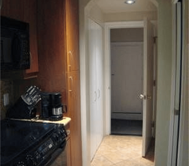 Standing in Kitchen area looking toward Unit entry door.