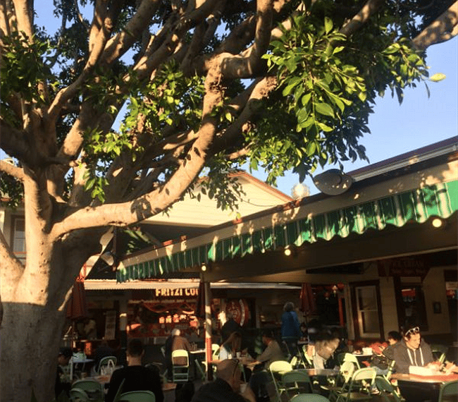 outdoor dining at Farmers Market with numerous options.