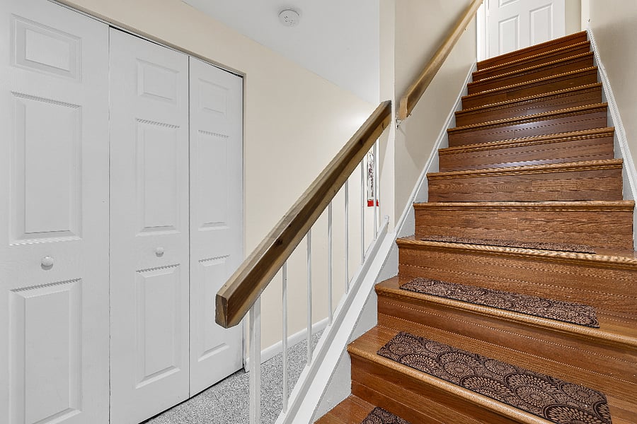 Stairs to the main floor of the house.