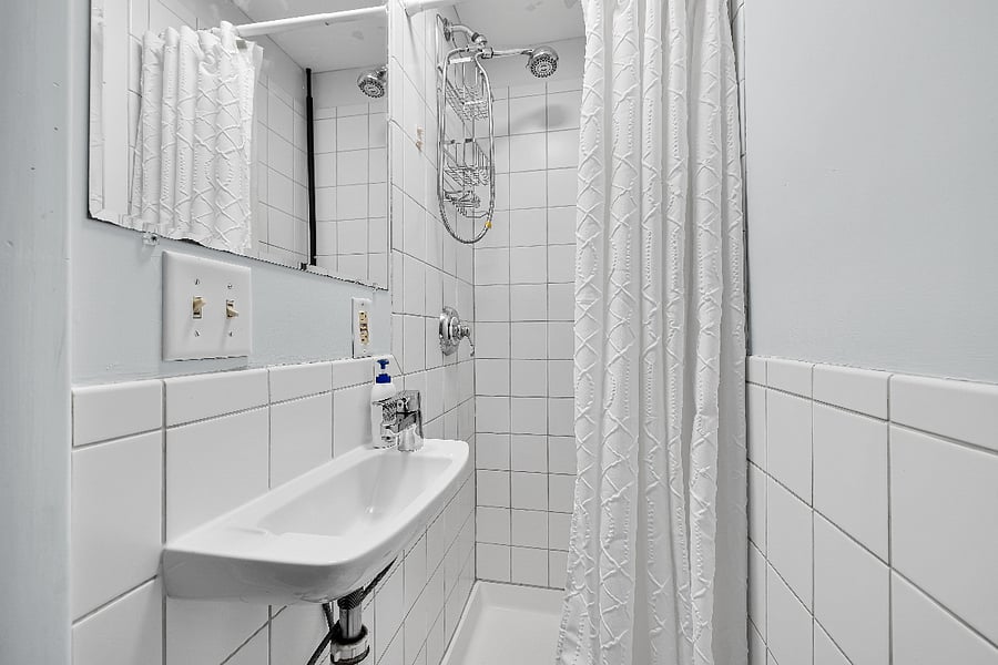 Cozy bathroom with perfect water pressure shower.