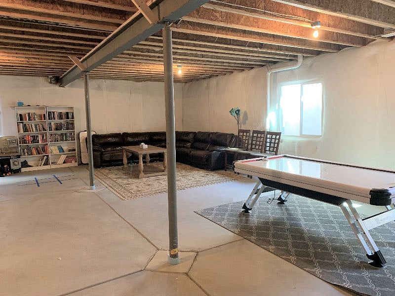 Basement - unfinished but set up and functional, extra 2100 sq ft of shared space and room for storage. 