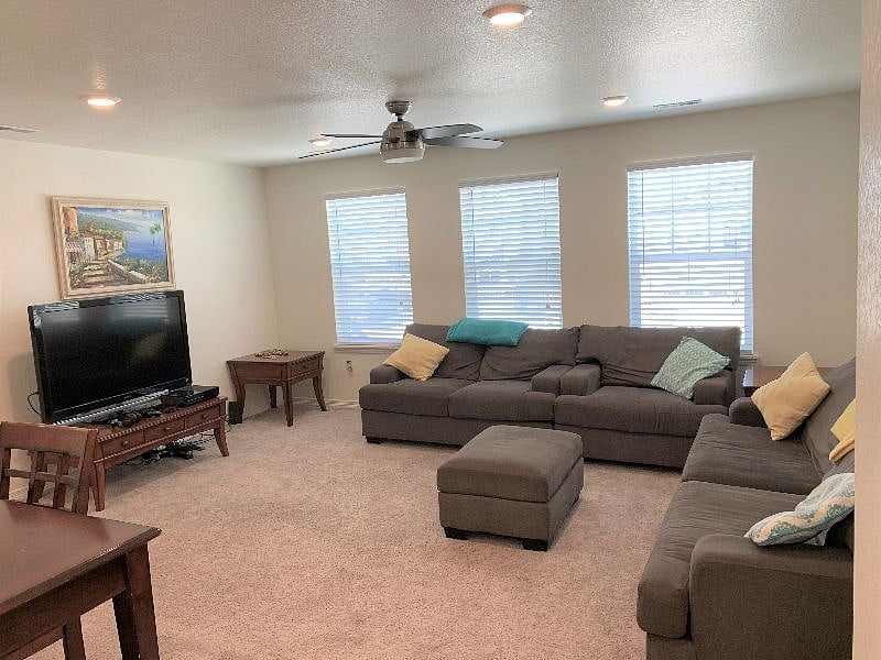 Upstairs loft - couch, TV, table/desk