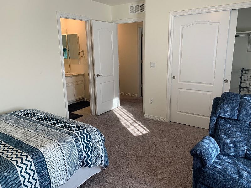 Private attached bath, door to hallway, closet