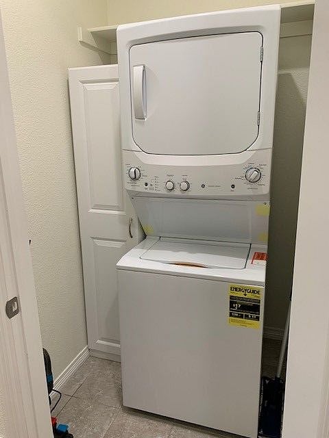 Has been replaced with full size front load washer and dryer - will get updated pic after tenant moves out. 
