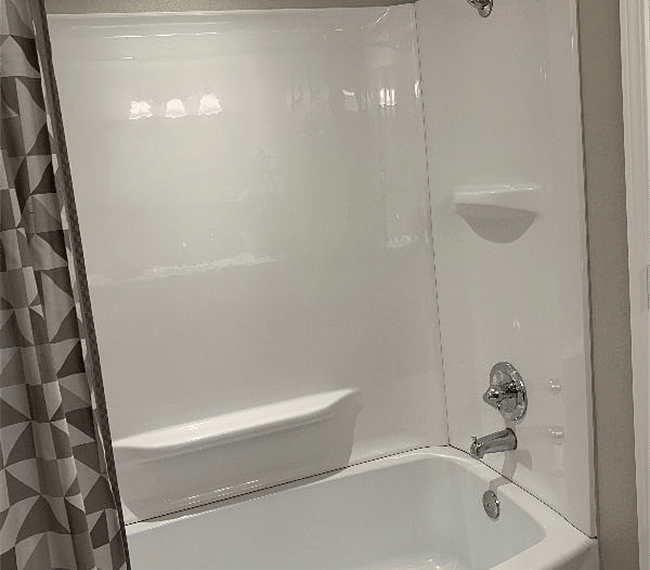 Fully equipped bathroom with soaking bathtub
