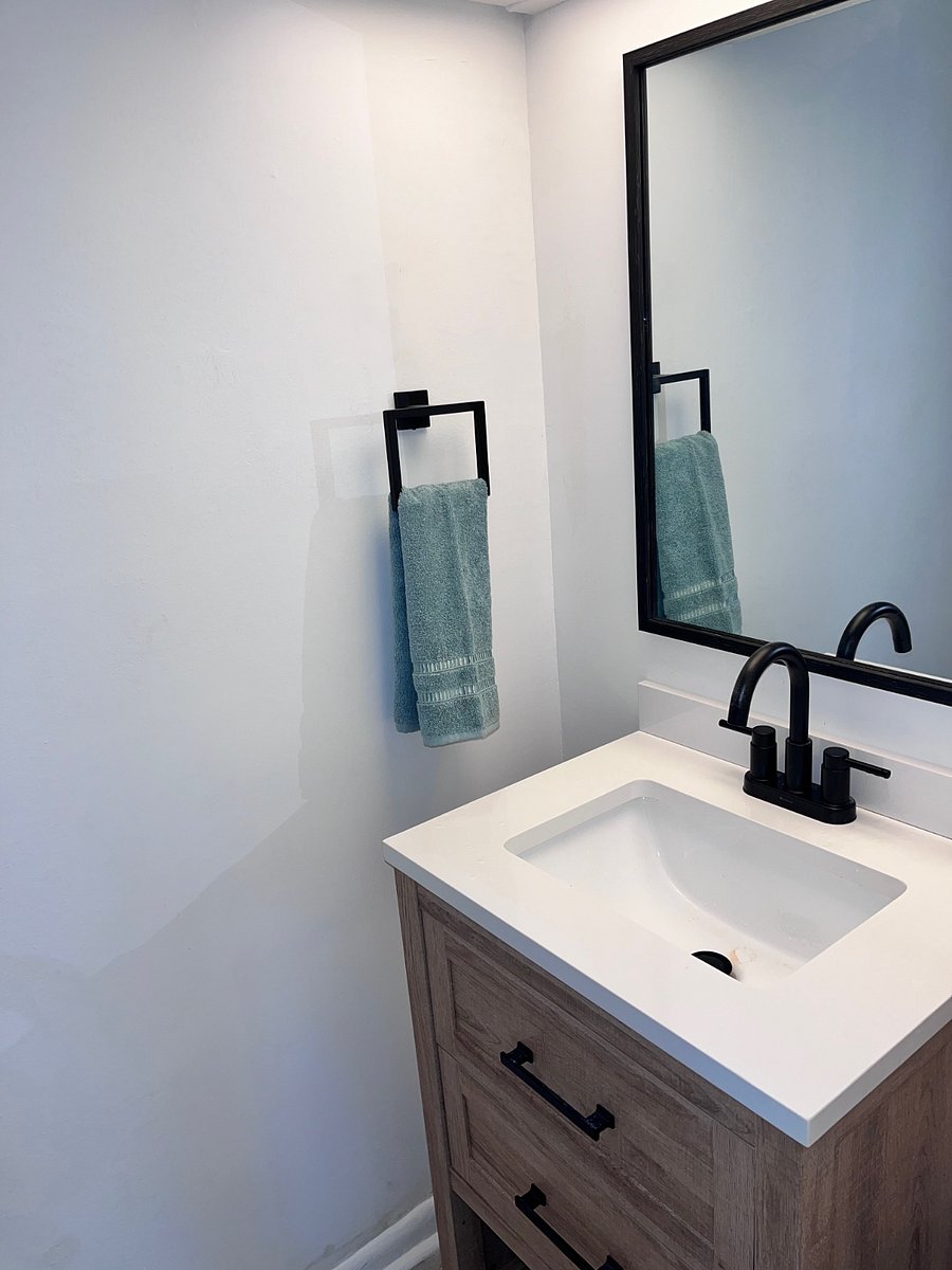 Downstairs half bath ... cute as can be.