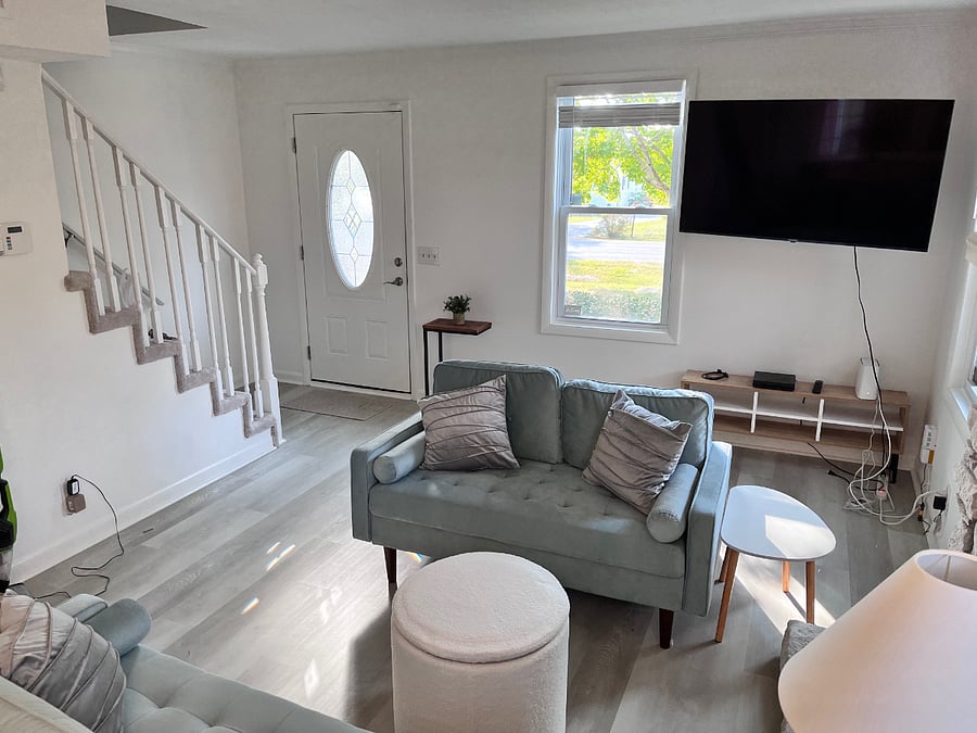 Living room with front door closed