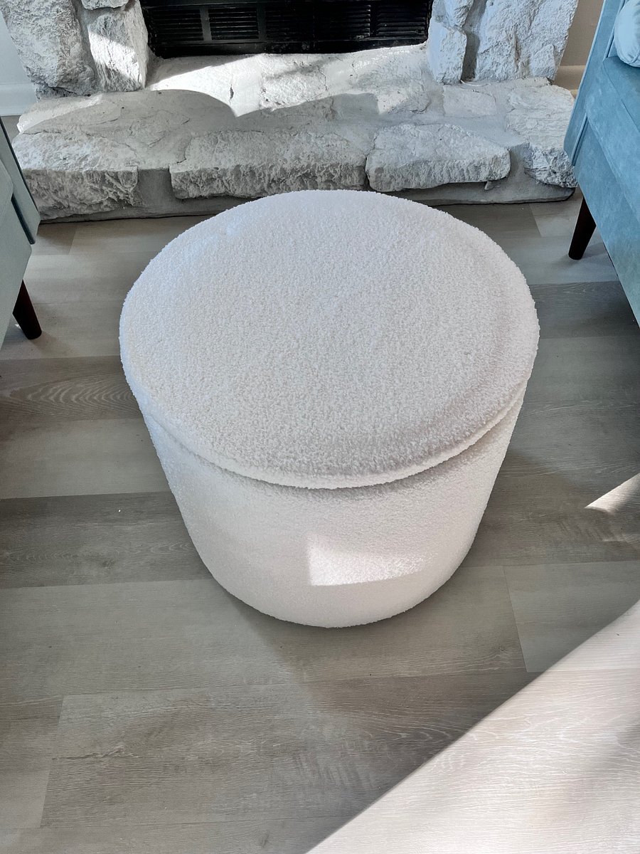 Living room ottoman lid is double sided! - one side foot rest, other side table top. Also has storage inside for blanket, etc.