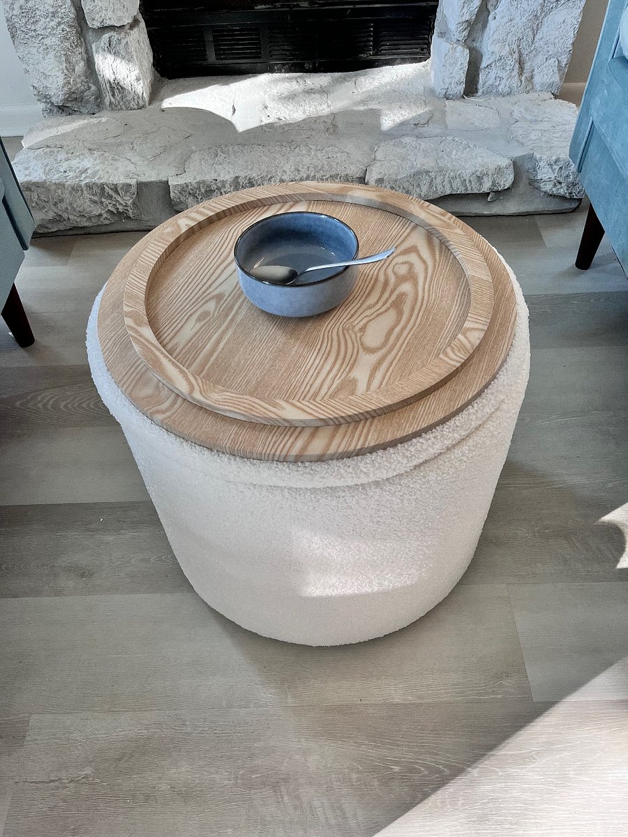 Living room ottoman lid is double sided! - one side table top, the other for foot rest Also has storage inside for blanket, etc.