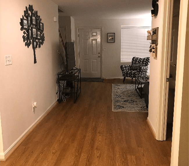 View from Kitchen looking at front door and living room. All open living plan on main level