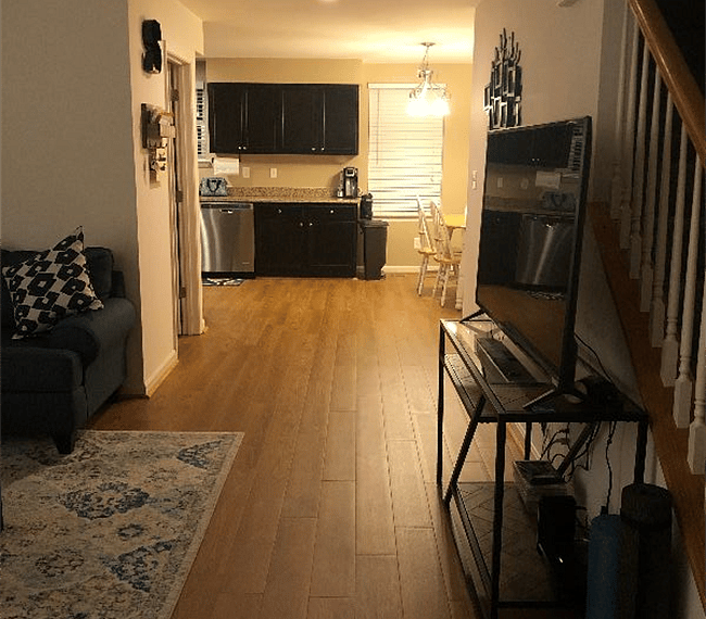 View to Kitchen/Dining Table from Front Door. All open living plan