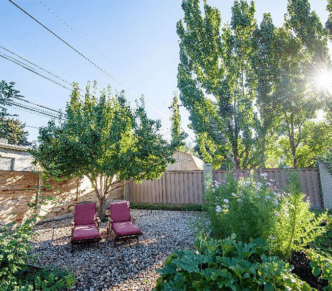 Amazing backyard garden with comfy chairs