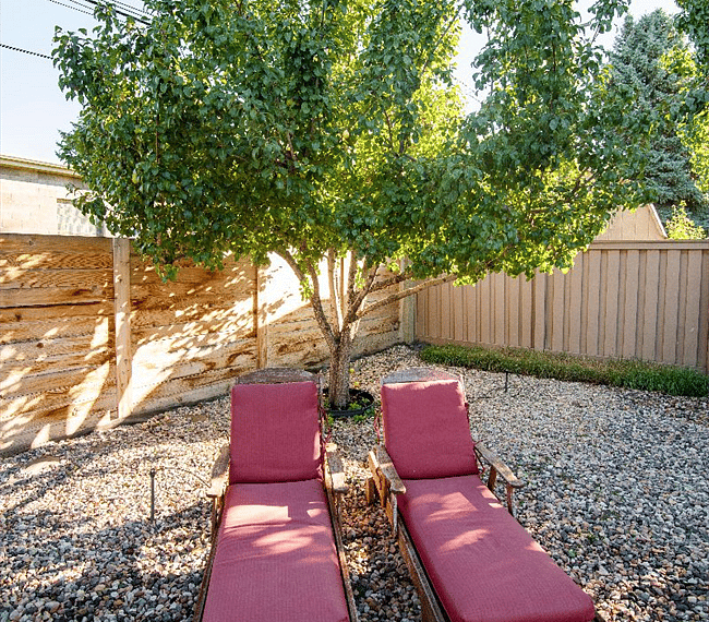 Amazing backyard garden with comfy chairs