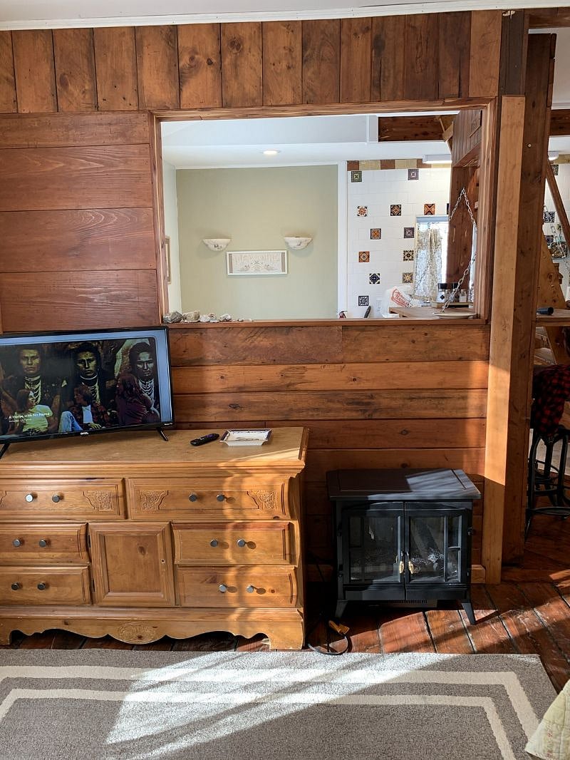 TV and storage chest.