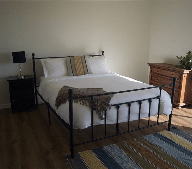 2nd bedroom with queen size bed and large closet