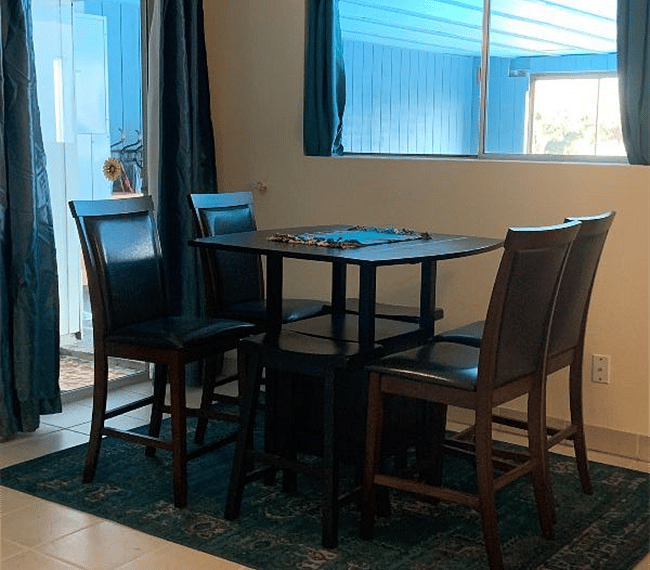 Dining area that looks out over the pool.
