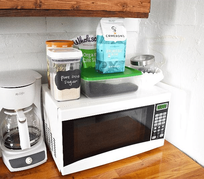 Microwave, coffee pot, stove, and toaster...the kitchen has it all!