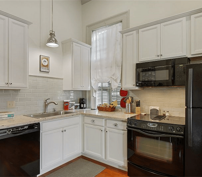 Eat-in Kitchen totally renovated 2018, fully furnished with modern appliances, quartz counters, quality cabinetry and all kitchenware