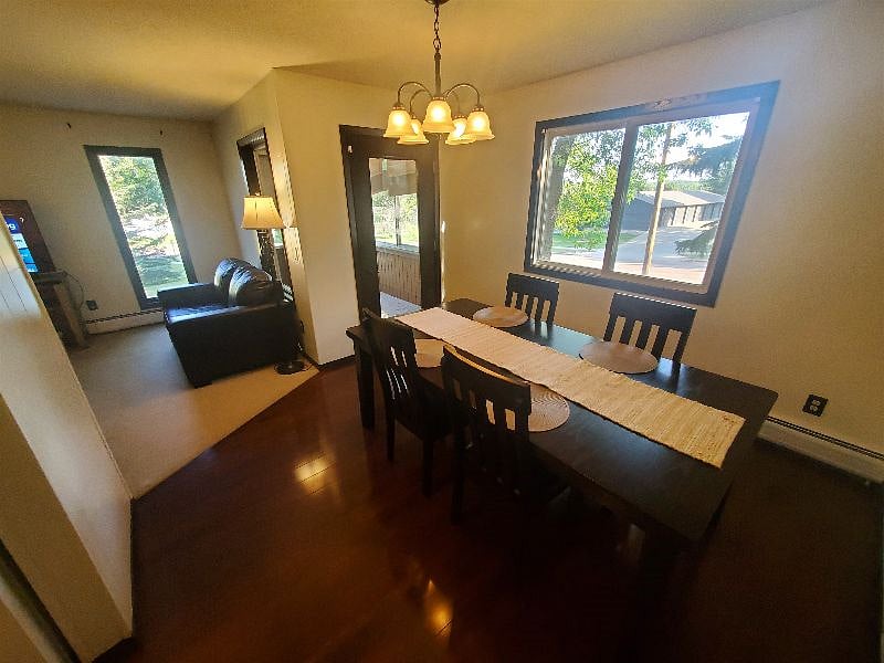 KP101APT1 - Dining Room w/four place settings access to porch