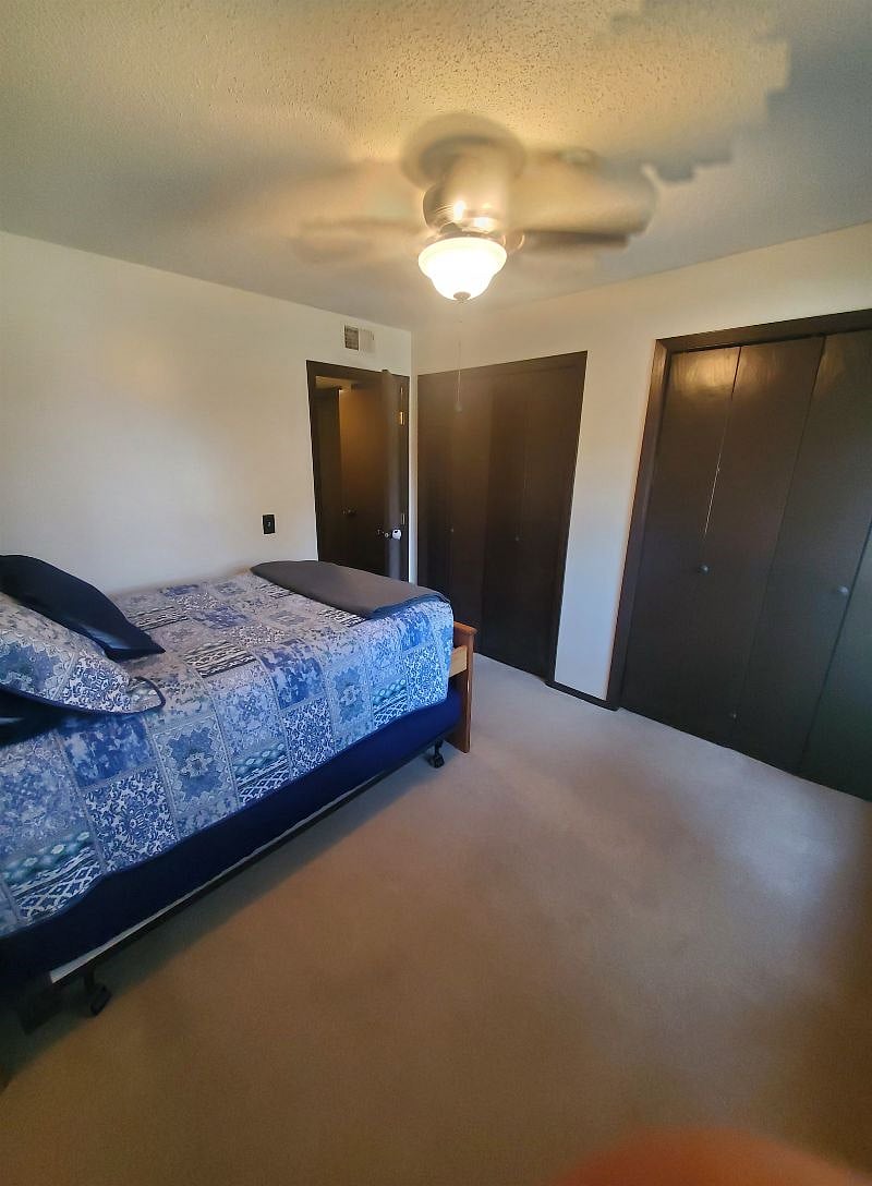 KP101APT1 - Guest bedroom w/fullsize bed, trundle bed, two closets, and ceiling fan