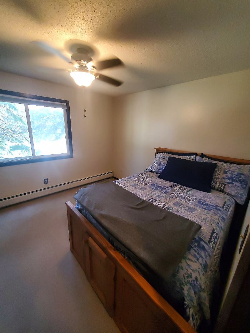 KP101APT1 - Guest bedroom w/fullsize bed, trundle bed, two closets, and ceiling fan