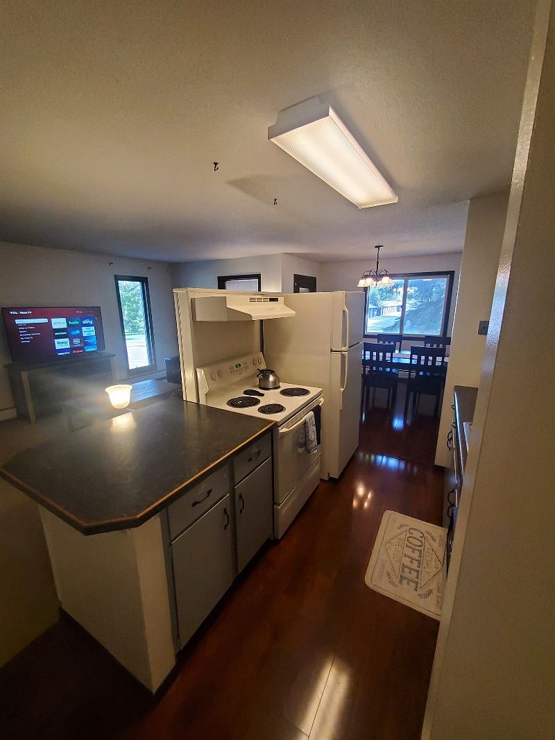 KP101APT1 - Kitchen w/appliances, microwave, dishwasher, cookware/bakeware, place settings, and kitchen essentials, and coffee machine