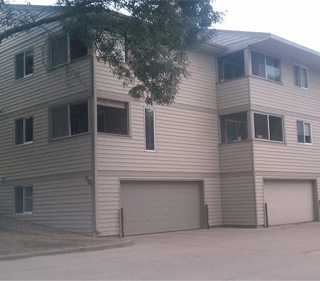KP101 - Southwest corner of property with parking lot and garages
