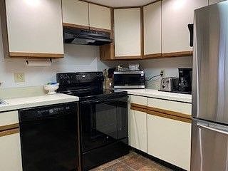 Full size electric, self-cleaning stove, Microwave/Air-fryer, Coffee maker, Toaster