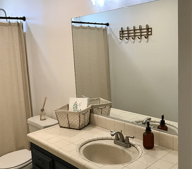 Full bathroom with walk.in shower & mirror