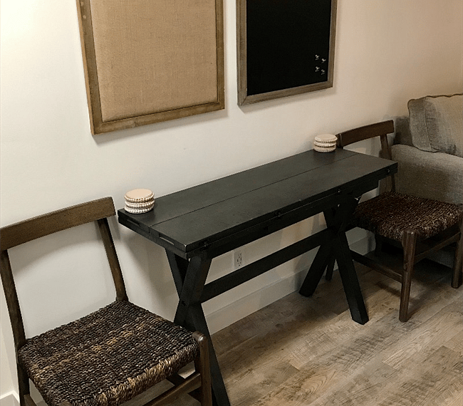Spacious living room with lawson style sofa, dining table for 2, drawers & TV
