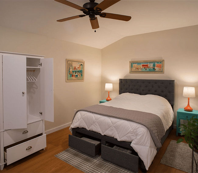 Comfy queen size bed with storage.
