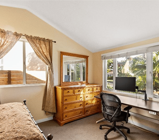 Cozy & bright bedroom with traditional queen size bed, wide drawer, mirror & work station